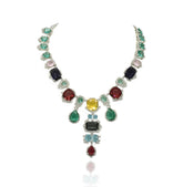 Multicolor statement necklace set with green, blue, pink, yellow, aqua, and wine stones in a silver-tone setting with matching drop earrings.