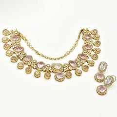 Blush pink and clear American Diamond necklace set in a gold-tone finish with floral detailing, dangling stones and matching drop earrings.
