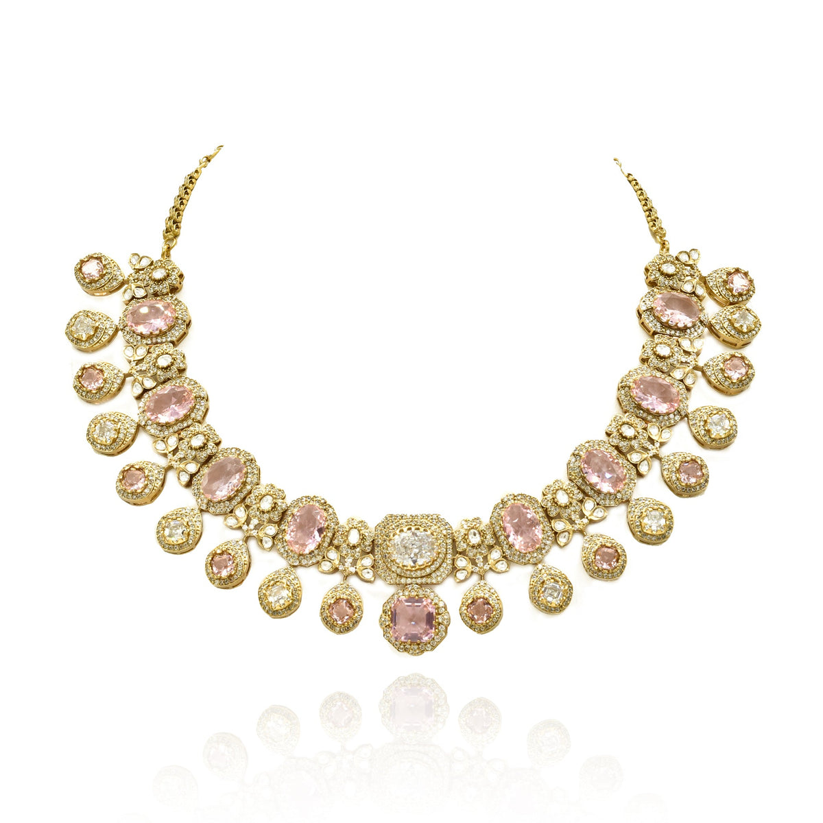 Blush pink and clear American Diamond necklace set in a gold-tone finish with floral detailing, dangling stones and matching drop earrings.