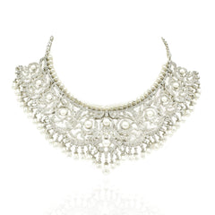 Silver-tone American Diamond choker necklace set with intricate floral detailing, white pearl accents, cascading pearl drops and matching earrings.