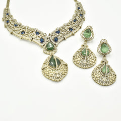 Blue and green American Diamond statement necklace set with floral crystal detailing, large geometric pendant and matching long earrings.