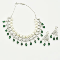 Silver-tone pearl and American Diamond necklace set with white pearls, jewel-green drop stones, sparkling crystal detailing and matching long earrings.