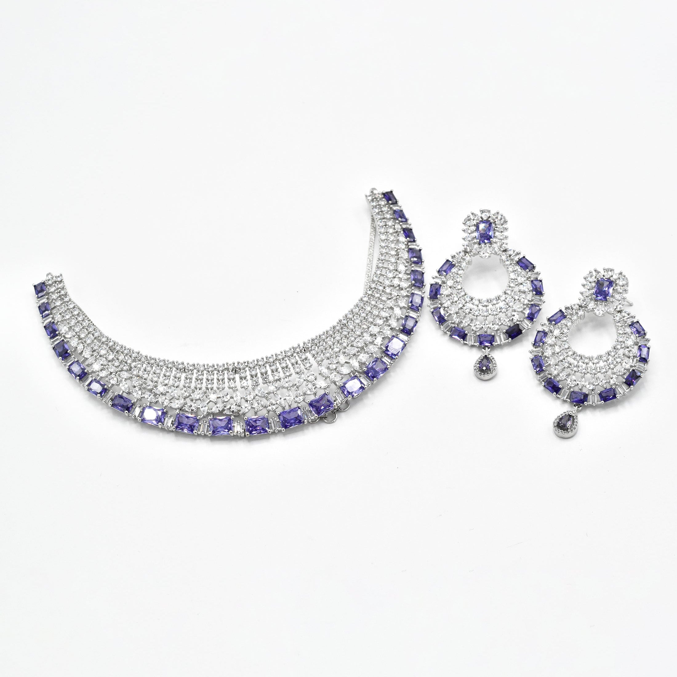 Purple American Diamond choker necklace set with rectangular purple stones, sparkling clear crystals and matching circular statement earrings.