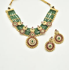 Aarnika Antique Gold Motif Pendant Necklace Set