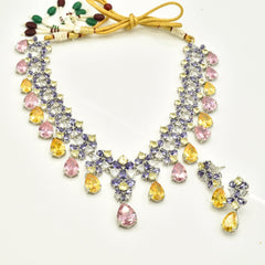 Multicolor American Diamond necklace set with lavender purple, blush pink, yellow and clear stones, teardrop accents and matching earrings.