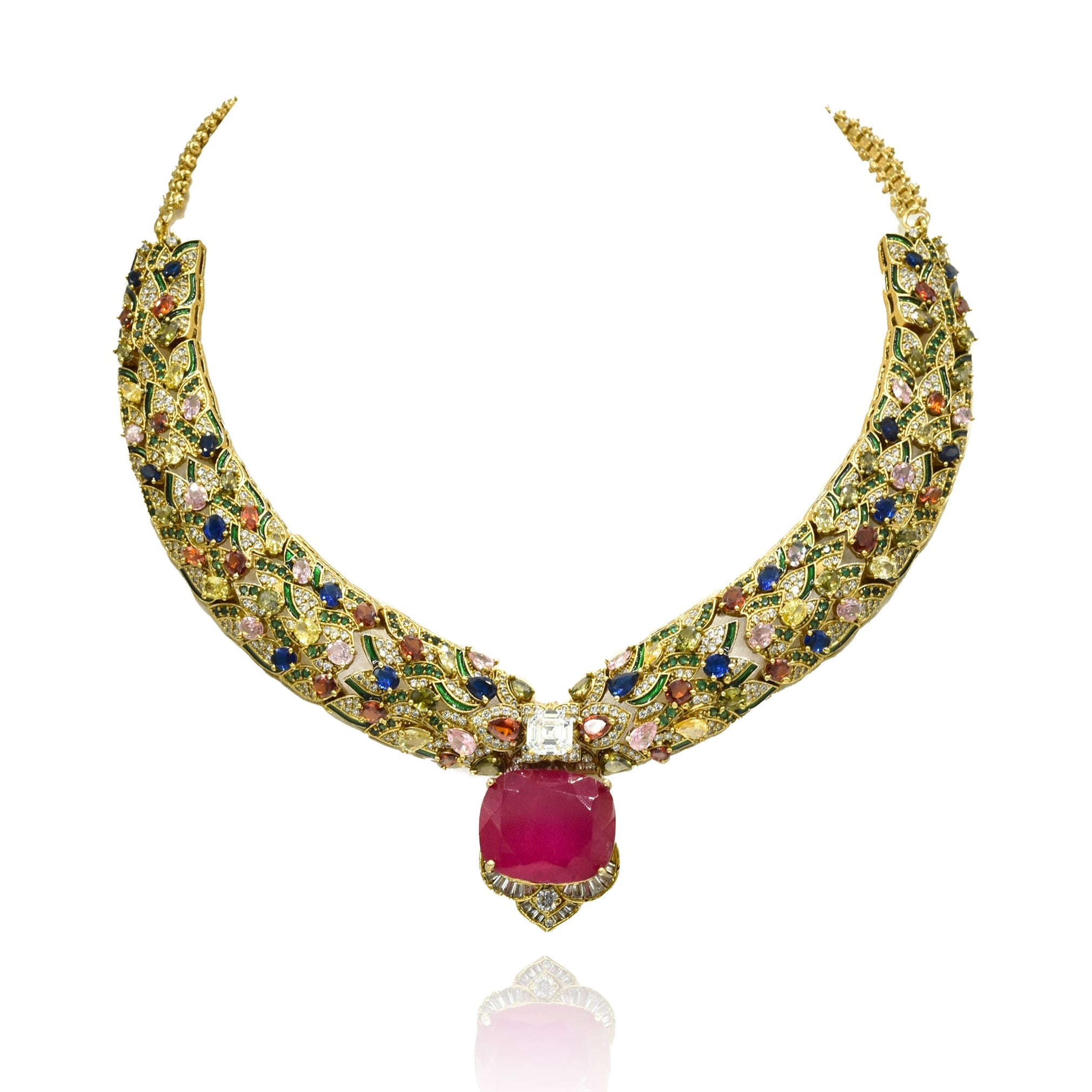 Gold-tone multicolor statement necklace set with intricate jewel-tone stones, bold deep pink center stone and matching pink statement earrings.